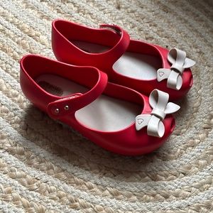Mini Melissa red shoes with bows
